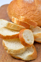 fresh wheat sliced bread on kichen board