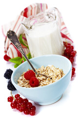 healthy breakfast with bowl of oat flakes