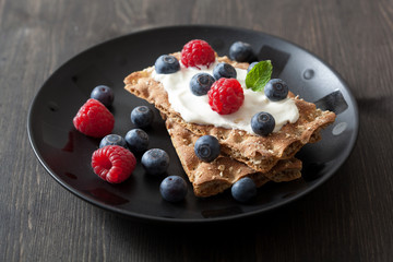 crisp bread with creme fraiche and berries