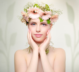 beautiful girl wearing wreath of flowers