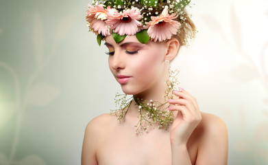 beautiful girl wearing wreath of flowers