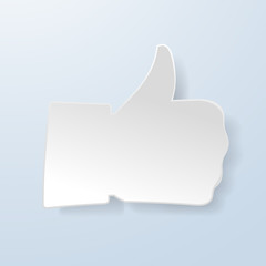 Thumbs up paper sign on light blue background. Like symbol used
