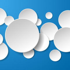 Abstract white paper circles on blue background