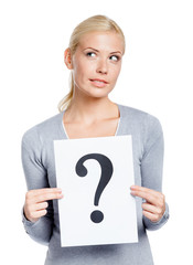 Girl in grey sweater keeps paper with question mark