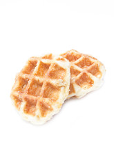 Close up of waffle on white background.