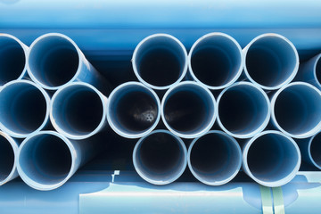 PVC pipes stacked in construction site