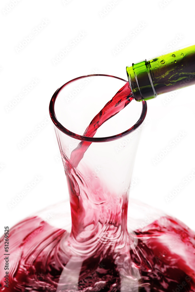 Sticker Red wine being poured in a decanter