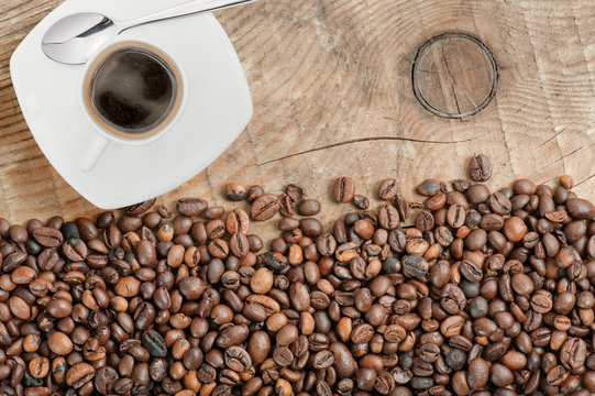 coffee beans with cup of coffee