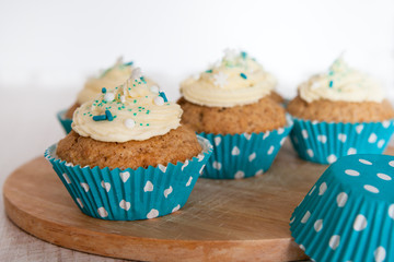 Cupcakes with vanilla topping
