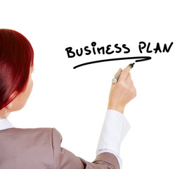 Frau schreibt das Wort Business Plan