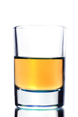 Close up of shot alcohol drink on white background