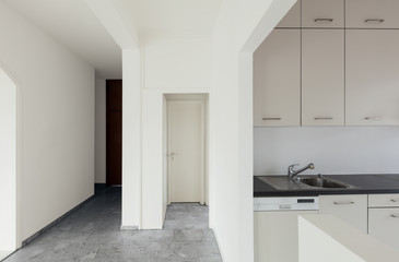 White apartment Interior, view of the kitchen, detail