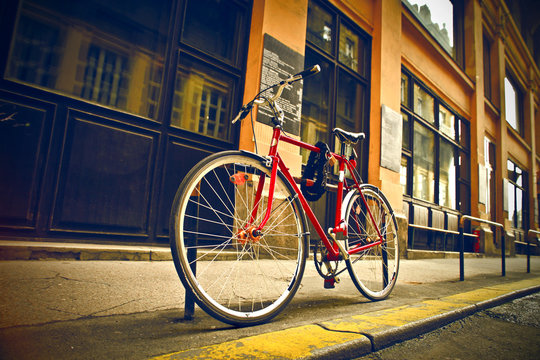 Fototapeta red bicycle on the street