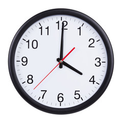Office clock shows exactly four o'clock