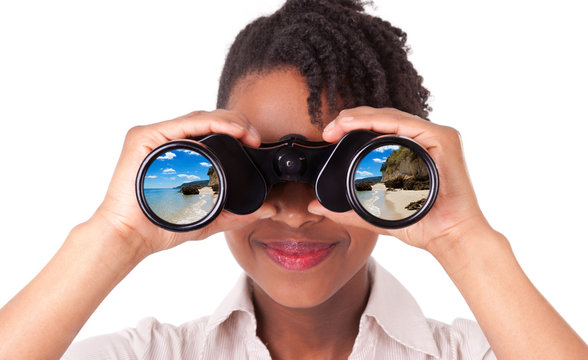 Young black / african american business woman using binoculars l