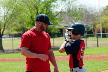 Baseball coach and teen player