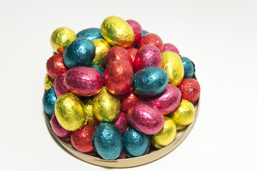 Colored Easter eggs on a dish