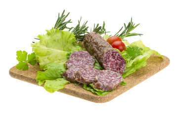 Salami with rosemary, salad and tomatoes