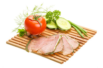 Ripe fresh ham with vegetables