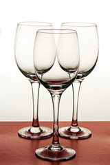 wine glasses on a colored background.