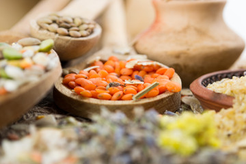 Wooden spoons with different kinds of groats
