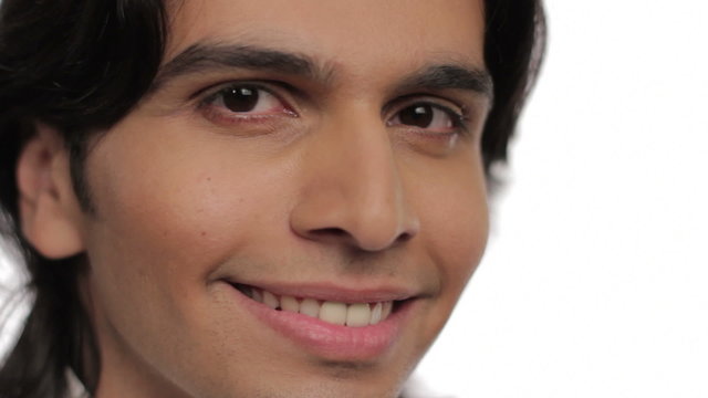 Close up of Indian man's face, happy