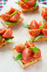 Bruschetta with fresh tomato and snow peas