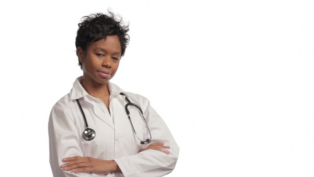 Confident female doctor, white background