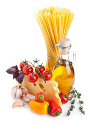 Still life with pasta ingredients isolated on white