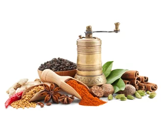 Wall murals Aromatic spices and herbs isolated on white