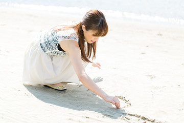 Beautiful asian woman on beach summer holiday