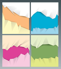 Collection of cut out colors paper background.