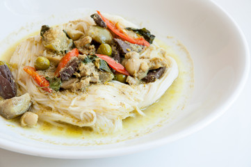 Khanom Chin, freshly made Thai rice noodles with green curry.