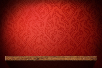 Blank Wood shelf with red retro wallpaper background