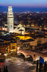 Obraz premium Ponte Pietra and Duomo of Verona in night, Italy