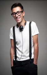 Fototapeta premium Portrait of a young man smiling with headphones