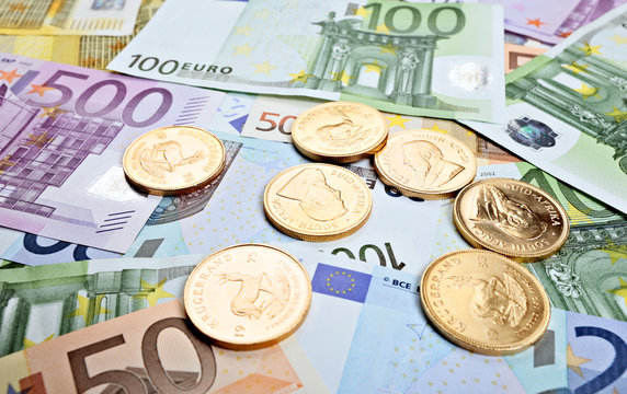 Goldm&uuml;nzen und Euroscheine