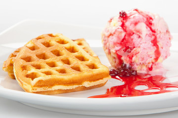 Belgian waffles with ice-cream and syrup