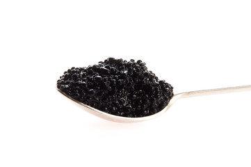Fototapeta na wymiar black caviar in spoon on white background