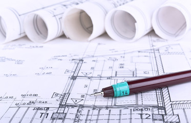Architect blueprints and rolls background