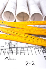 Architect blueprints and rolls background