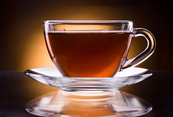 Cup of black tea isolated on a black background