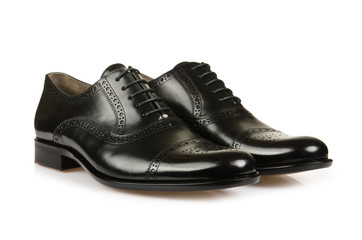 Fashion concept with male shoes on white
