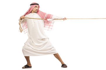Arab man in tug of war concept