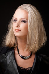portrait of blond woman with smokey eyes make up