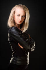 Obraz na płótnie Canvas blonde in leather jacket
