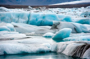 Fotobehang Icebergs in Jokulsarlon © Robert Hoetink