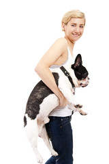Woman holding dog over white background