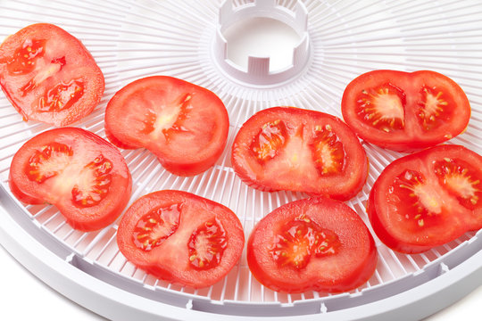 Fresh Tomato On Food Dehydrator Tray, Ready To Dry