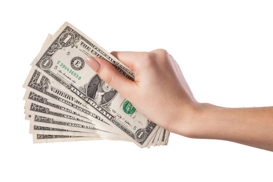Female hand holding money dollars isolated on white background
